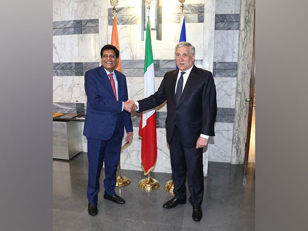 Piyush Goyal and Antonio Tajani plant trees under India’s green initiative in Italy.